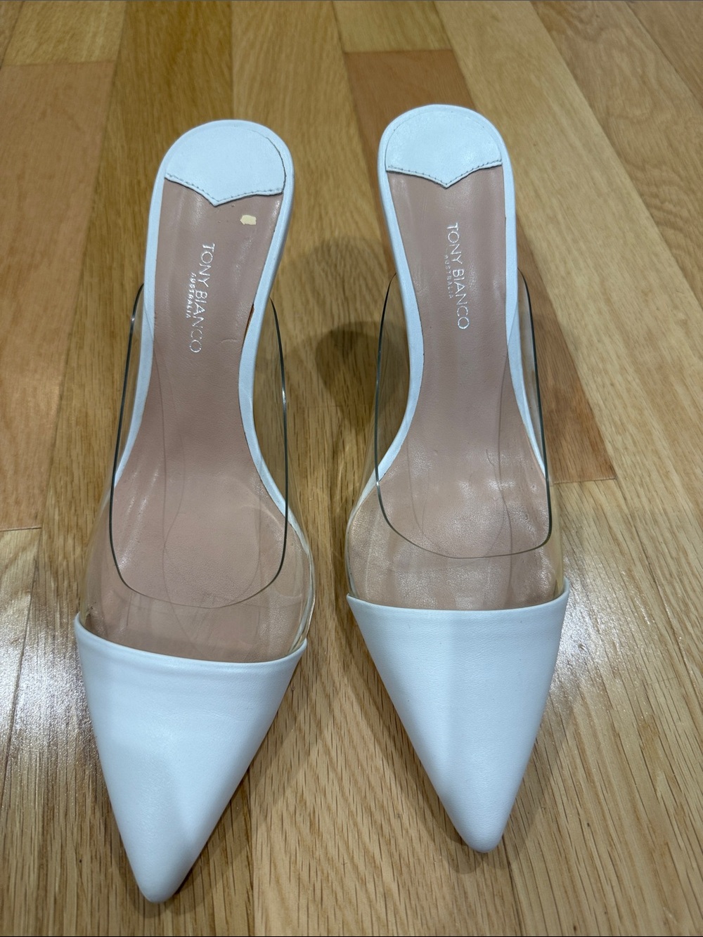 Tony Bianco Evon mules in white leather and clear vynalite